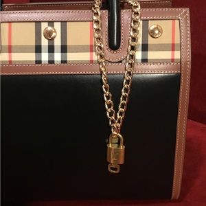 Authentic Louis Vuitton Lock and Key accessory with chain